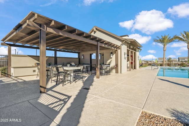 view of patio / terrace with a pergola and a fenced in pool