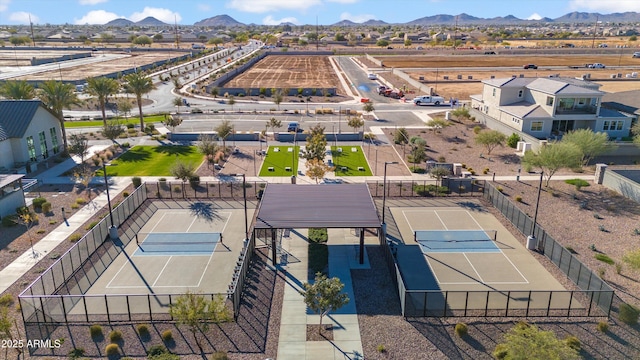 birds eye view of property featuring a mountain view