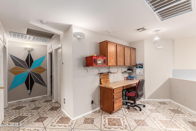 home office featuring visible vents, baseboards, and light tile patterned floors