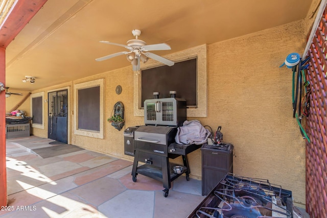 view of patio / terrace with ceiling fan