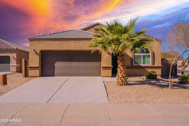 view of front of property with a garage