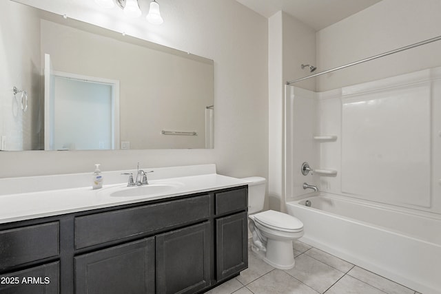 full bathroom featuring tile patterned flooring, vanity, toilet, and washtub / shower combination