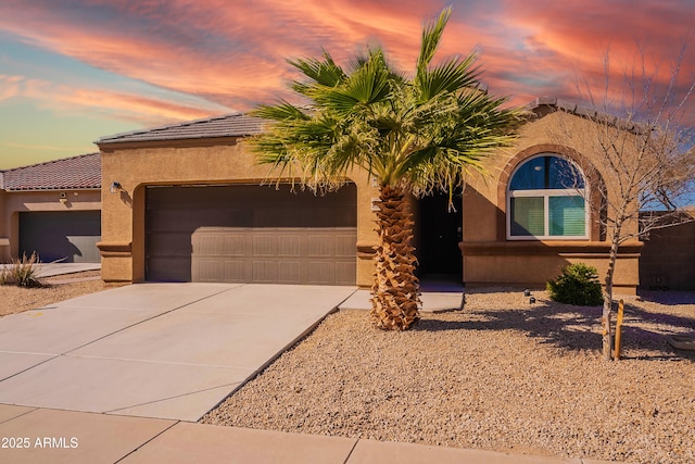 view of front of house with a garage