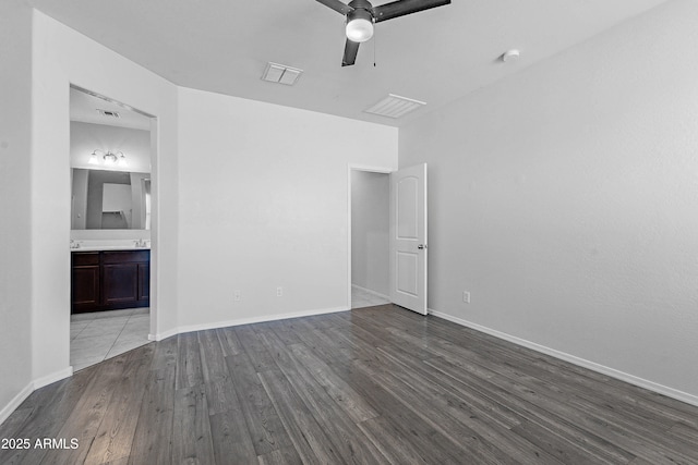 spare room with light hardwood / wood-style flooring and ceiling fan