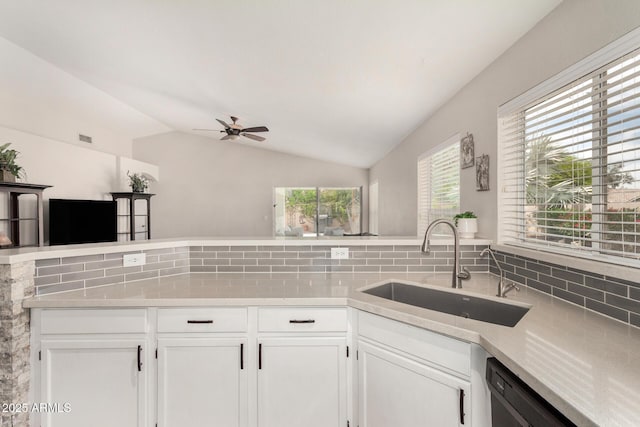 1653 E Gail Dr, Chandler, AZ 85225 - kitchen featuring a sink, tasteful backsplash, ceiling fan, dishwashing machine, and light countertops