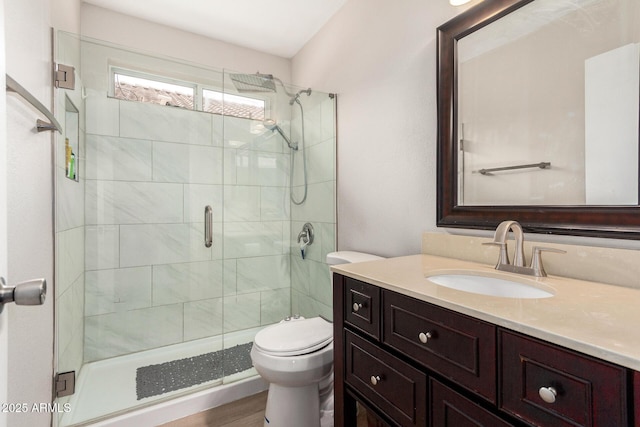 1653 E Gail Dr, Chandler, AZ 85225 - bathroom with vanity, a stall shower, toilet, and wood finished floors