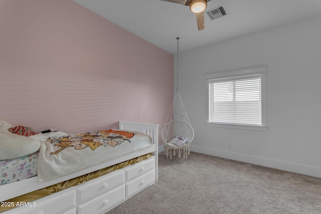 unfurnished bedroom with light carpet and ceiling fan