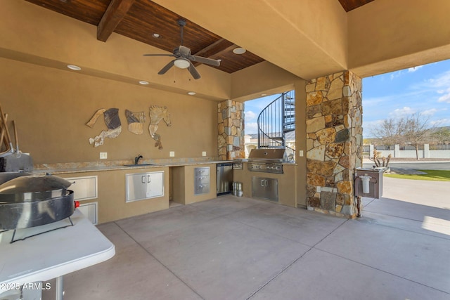 view of patio / terrace with an outdoor kitchen, ceiling fan, grilling area, and sink