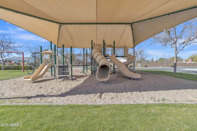 view of playground with a yard