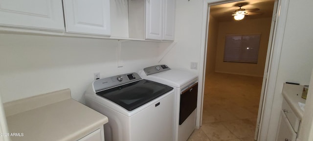 laundry room featuring cabinet space, light tile patterned floors, ceiling fan, and separate washer and dryer