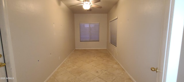 corridor with visible vents and baseboards