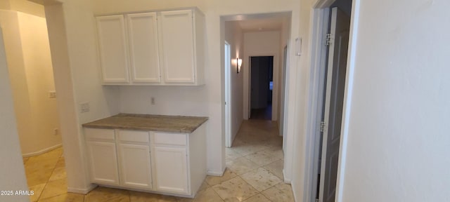 corridor with baseboards