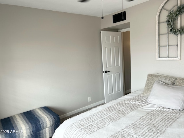 bedroom featuring baseboards