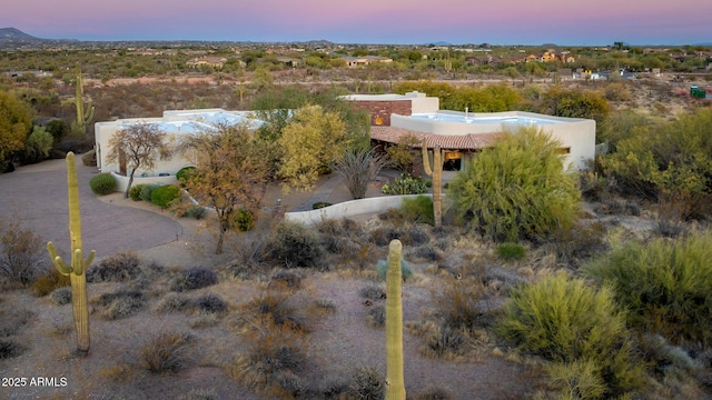 view of aerial view at dusk