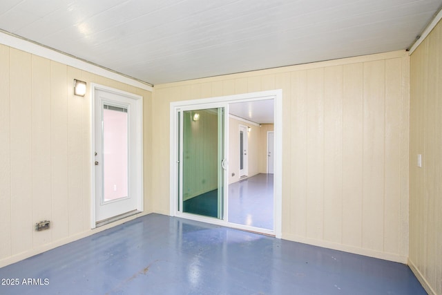 empty room featuring finished concrete flooring