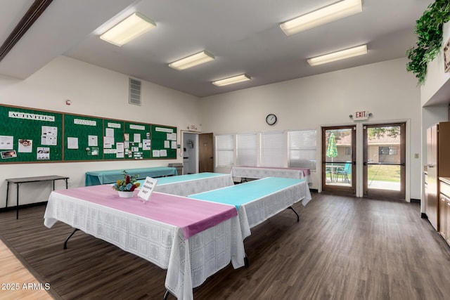 recreation room featuring wood finished floors