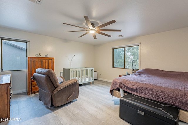 bedroom featuring ceiling fan