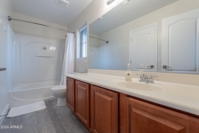 full bathroom featuring toilet, vanity, shower / bathtub combination with curtain, and tile patterned flooring