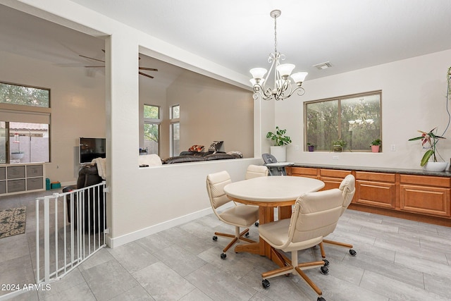 dining area with a notable chandelier