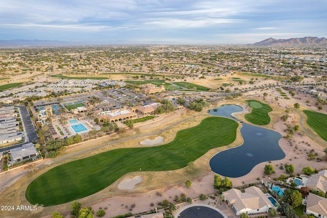 birds eye view of property featuring a mountain view