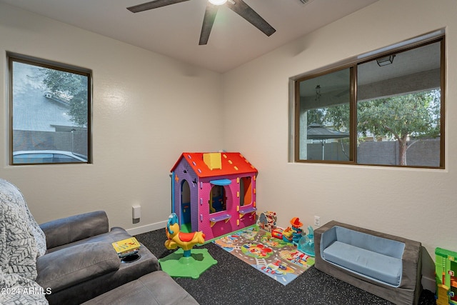 game room with ceiling fan