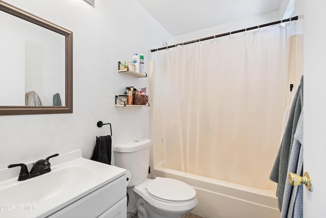 full bathroom featuring vanity, toilet, and shower / tub combo with curtain