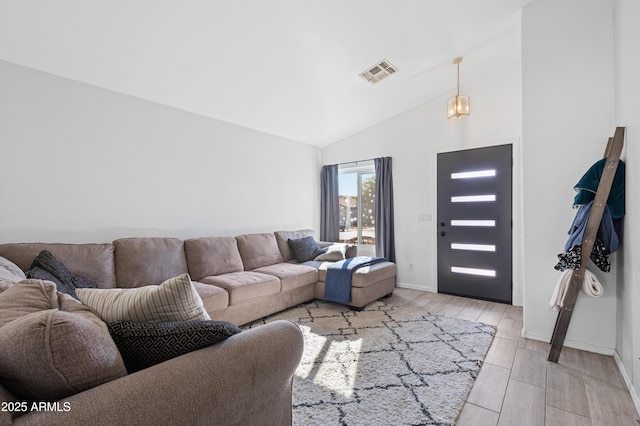 living room with vaulted ceiling