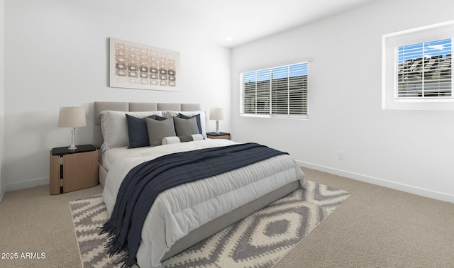 bedroom with light colored carpet