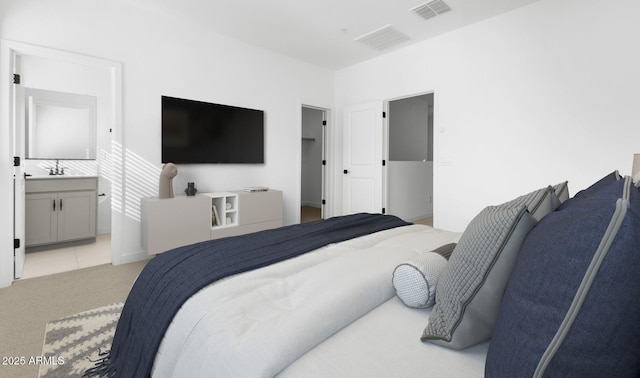 carpeted bedroom with ensuite bath and sink