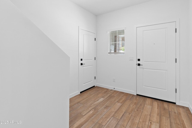 entrance foyer with light wood-type flooring