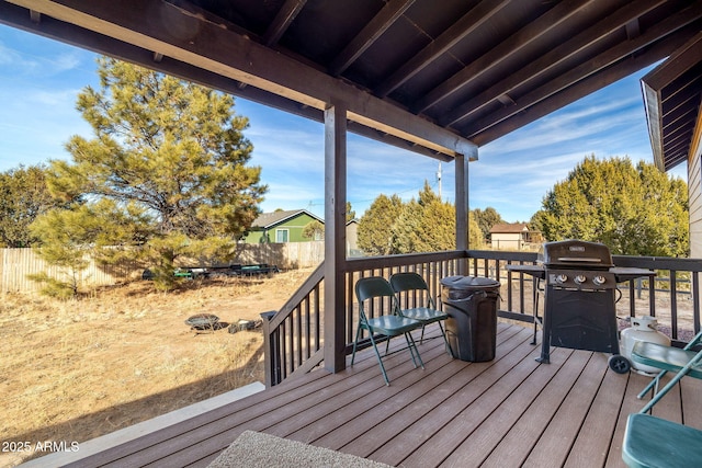 wooden terrace featuring grilling area