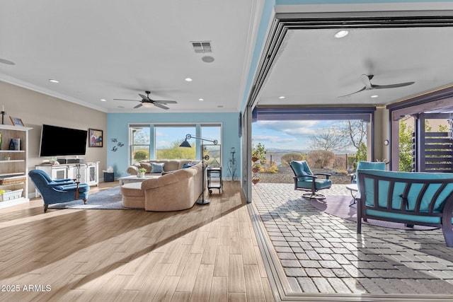 interior space featuring an outdoor living space and ceiling fan