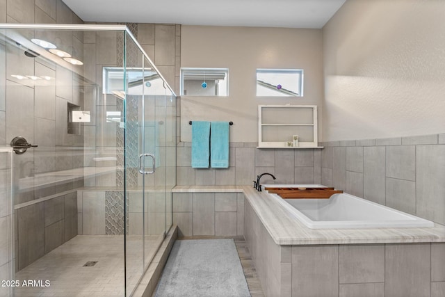 bathroom with independent shower and bath