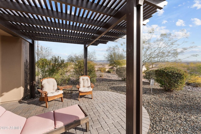 view of patio featuring a pergola