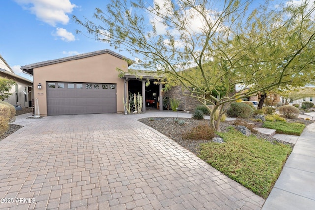 view of front of home with a garage