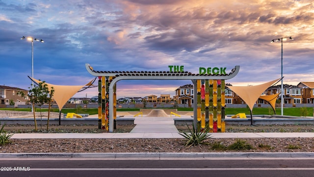 playground at dusk featuring a residential view