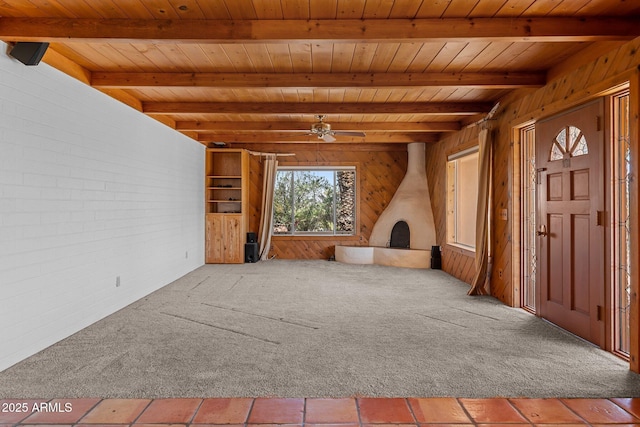 651 Chaparral Rd, Wickenburg, AZ 85390 - unfurnished living room featuring carpet floors, beamed ceiling, and wood ceiling