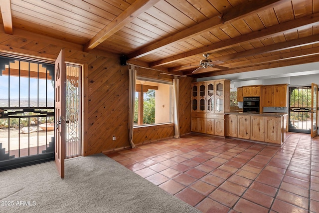 651 Chaparral Rd, Wickenburg, AZ 85390 - unfurnished living room with tile patterned floors, wooden ceiling, and beamed ceiling