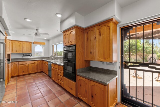 651 Chaparral Rd, Wickenburg, AZ 85390 - kitchen featuring stainless steel dishwasher, dobule oven black, ceiling fan, recessed lighting, and a sink
