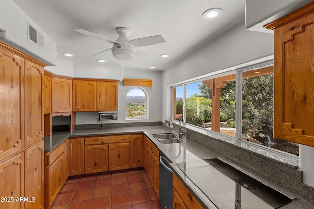 651 Chaparral Rd, Wickenburg, AZ 85390 - kitchen featuring ceiling fan, a sink, recessed lighting, dark tile patterned floors, and visible vents
