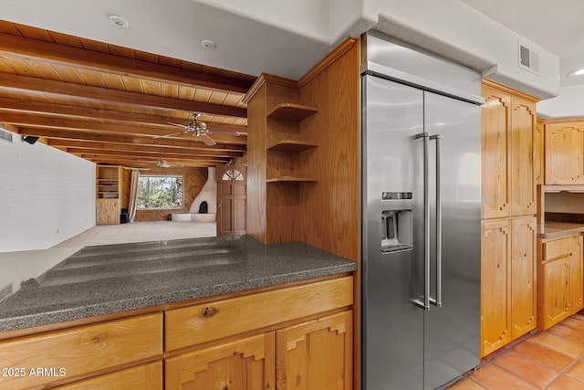 651 Chaparral Rd, Wickenburg, AZ 85390 - kitchen featuring visible vents, beam ceiling, ceiling fan, light tile patterned floors, and stainless steel built in refrigerator