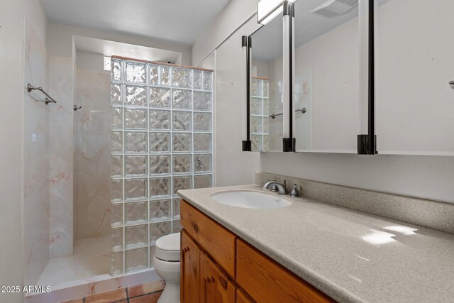 651 Chaparral Rd, Wickenburg, AZ 85390 - full bathroom with visible vents, tile patterned flooring, walk in shower, vanity, and toilet