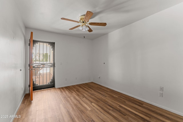 651 Chaparral Rd, Wickenburg, AZ 85390 - spare room featuring baseboards, ceiling fan, and wood finished floors