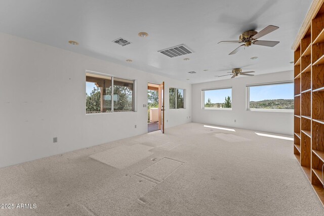 651 Chaparral Rd, Wickenburg, AZ 85390 - carpeted spare room with ceiling fan and visible vents