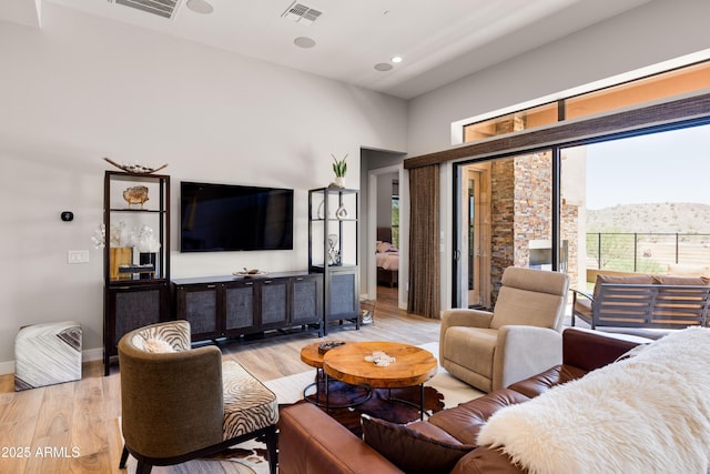 16134 E Ridgestone Dr, Fountain Hills, AZ 85268 - living room with light wood-style flooring and recessed lighting