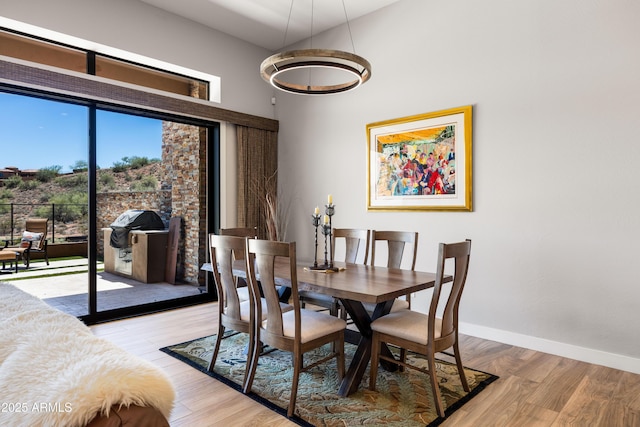 16134 E Ridgestone Dr, Fountain Hills, AZ 85268 - dining area with light wood-style floors and a chandelier