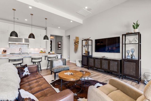 16134 E Ridgestone Dr, Fountain Hills, AZ 85268 - living room with light wood-style flooring and recessed lighting
