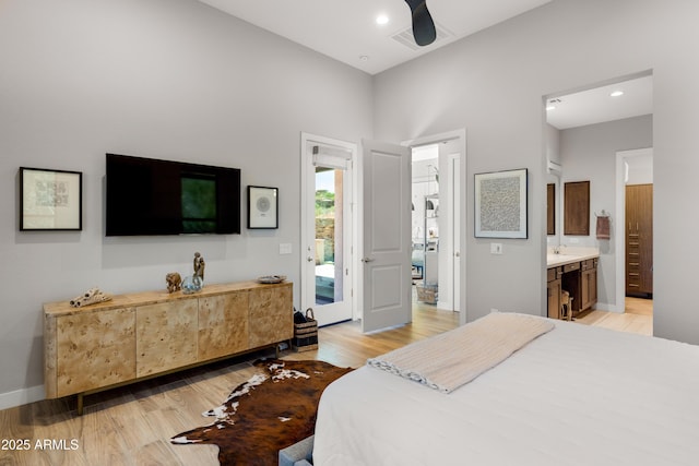 16134 E Ridgestone Dr, Fountain Hills, AZ 85268 - bedroom with light wood-style flooring, connected bathroom, access to outside, and recessed lighting