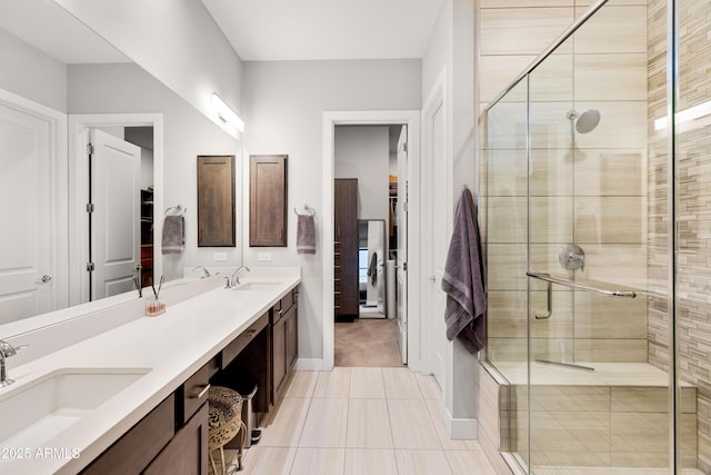 16134 E Ridgestone Dr, Fountain Hills, AZ 85268 - bathroom featuring a shower stall, double vanity, and tile patterned flooring
