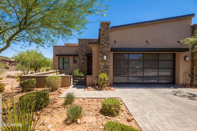 16134 E Ridgestone Dr, Fountain Hills, AZ 85268 - view of front of property with decorative driveway, stucco siding, and an attached garage